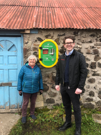 Image Marilyn Edwards of the Craigencalt Rural Community Trust and Tom Antram, Communications Consultant at Fife Ethylene Plant with the defibrillator at Kinghorn Loch